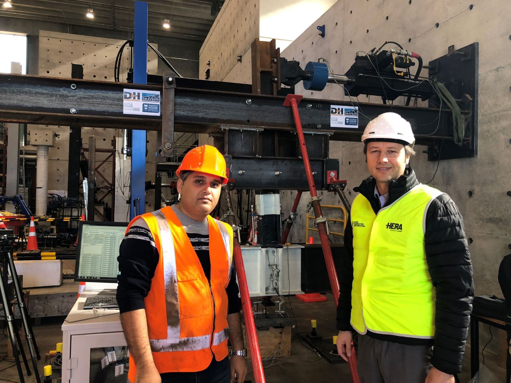 HERA Foundation Scholar Hafez Taheri and New Zealand Welding Centre General Manager Dr Michail Karpenko in front of the test rig at Auckland University